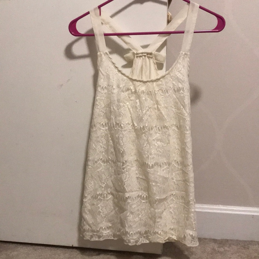Cream lace top with bow back